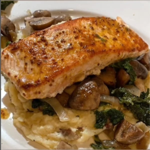 Grille No. 13's salmon with whole grain mustard, mashed potatoes, mushrooms, and kale.
