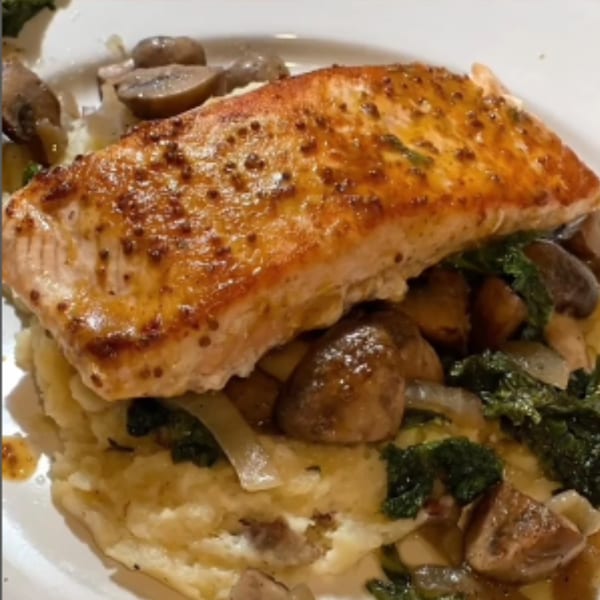Grille No. 13's salmon with mustard glaze, mashed potatoes, mushrooms, and kale.